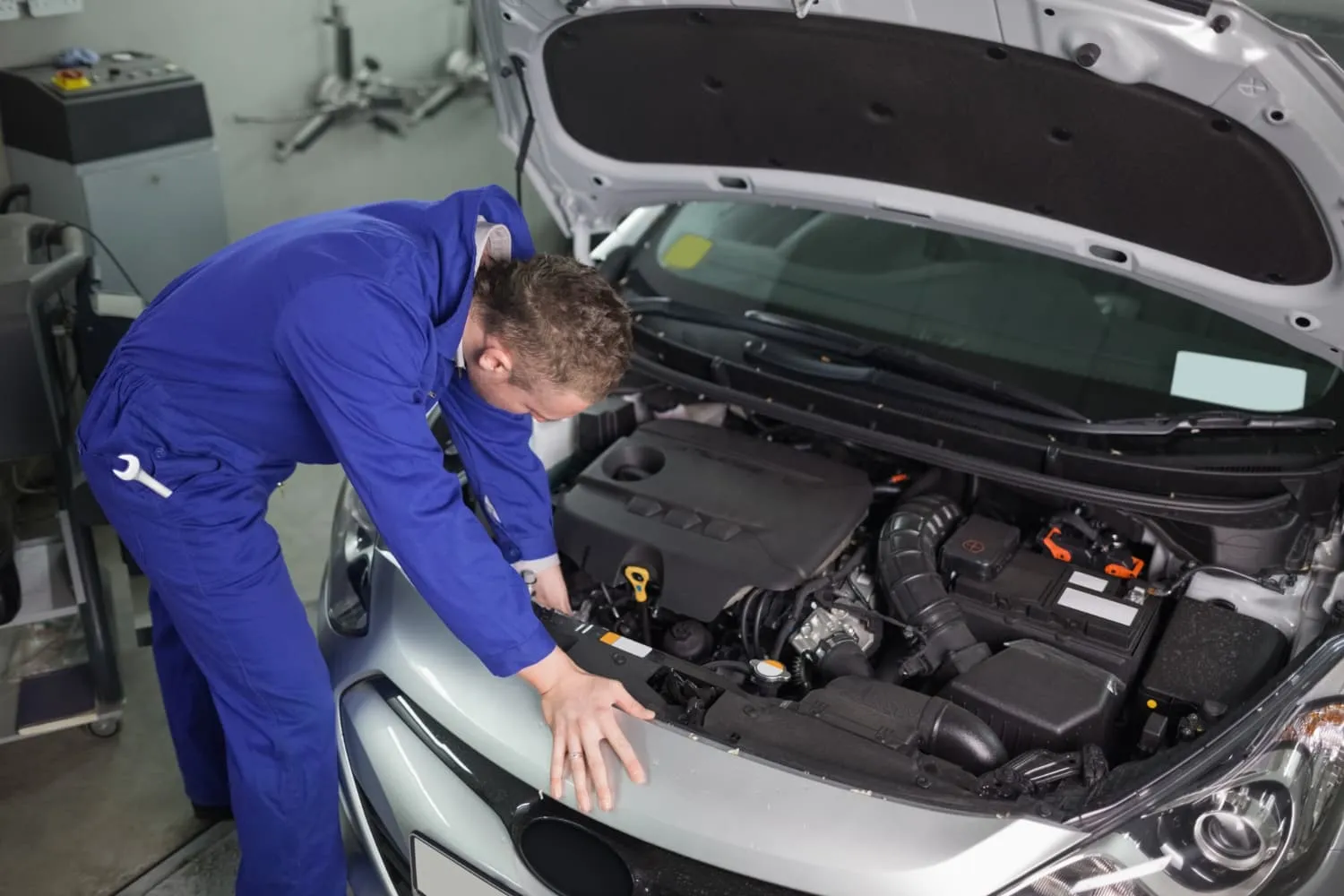 Mechanic performing vehicle repair